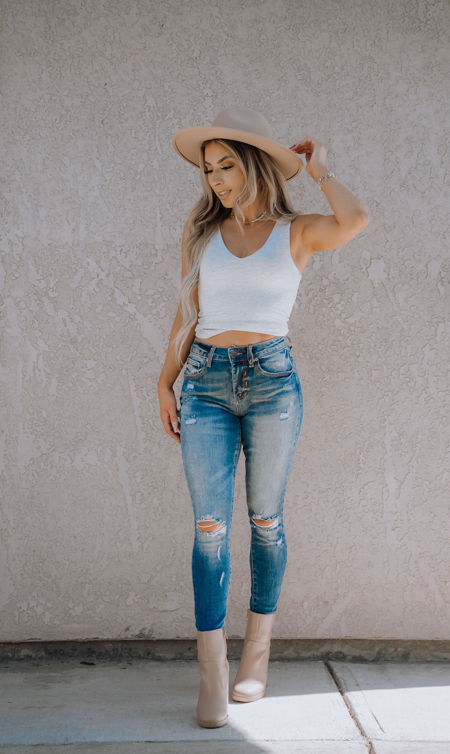 Distressed Mid Rise Skinny Jeans